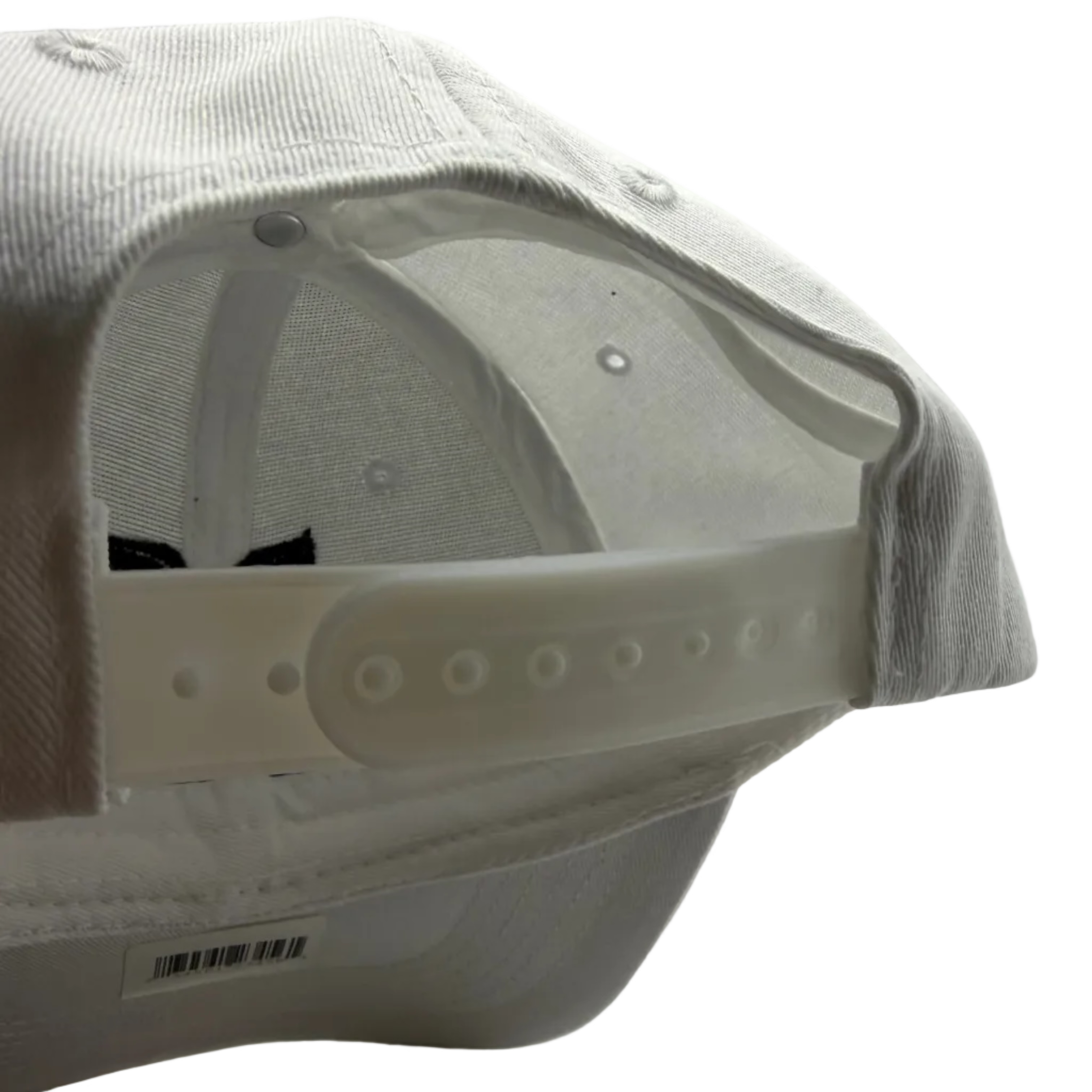 White cap with a visible brand label on a white background